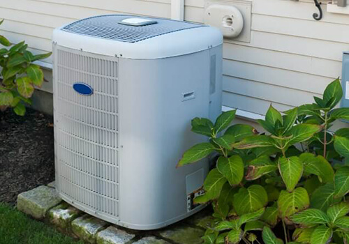 Technician replacing Air Conditioning