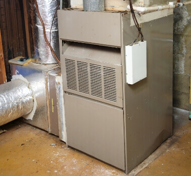 Old Furnace unit in basement