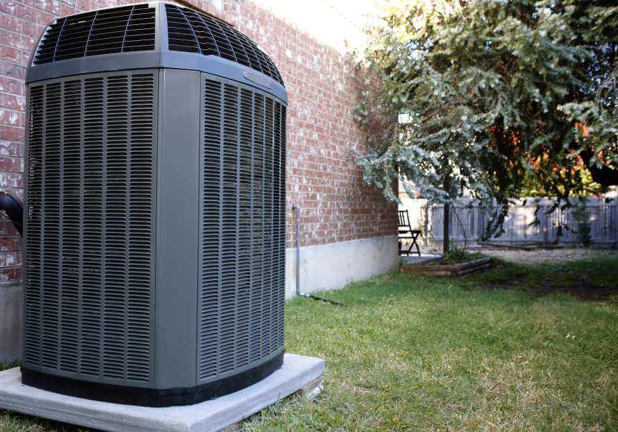 Heat Pump Unit On the side of a house